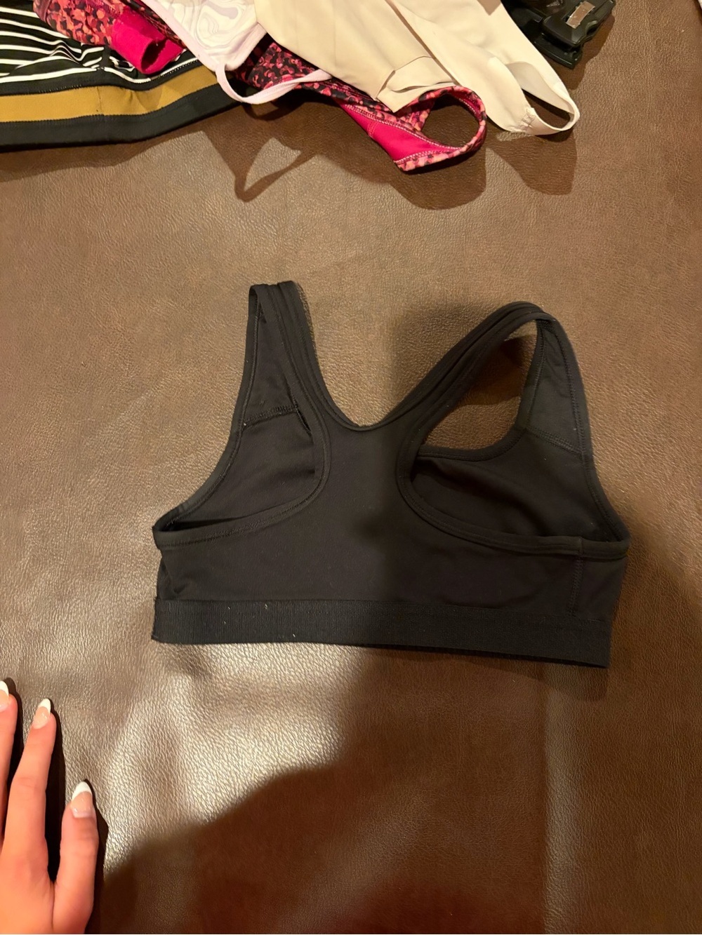 Lot of sports bras includingNike Black Racerback Sports Bra - 4 bras kids
